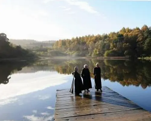 Monks by the water