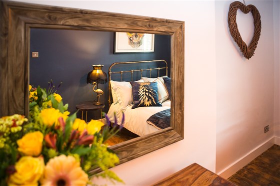Main Bedroom reflected in dressing table mirror