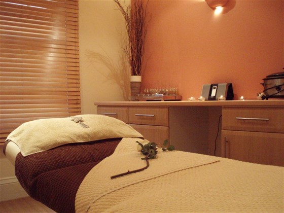 Treatment room with heated couch