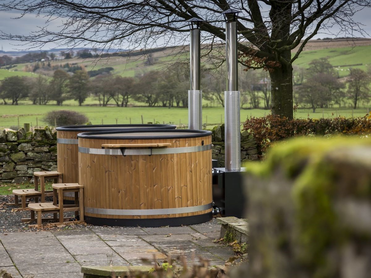 Our new log fired Hot Tubs adjacent to the Garden Room
