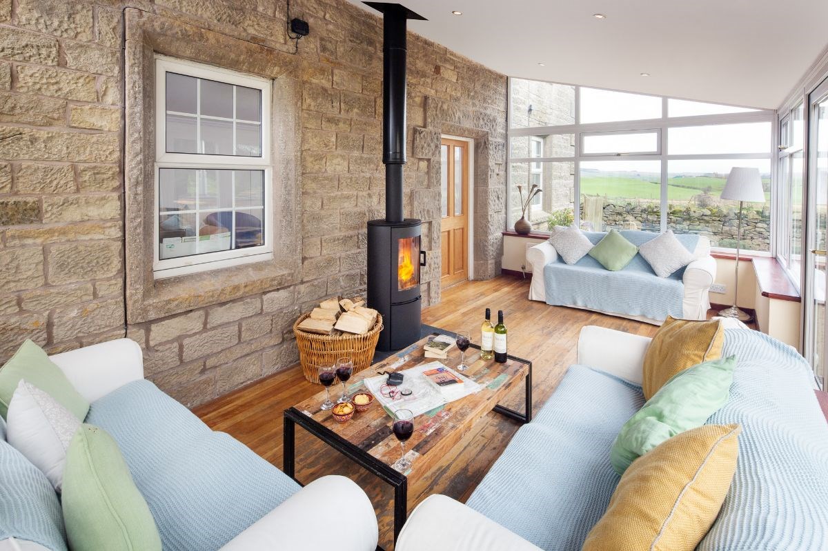 Warm and cosy garden room with log burner.