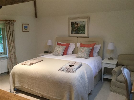 Bedroom made up with superking bed