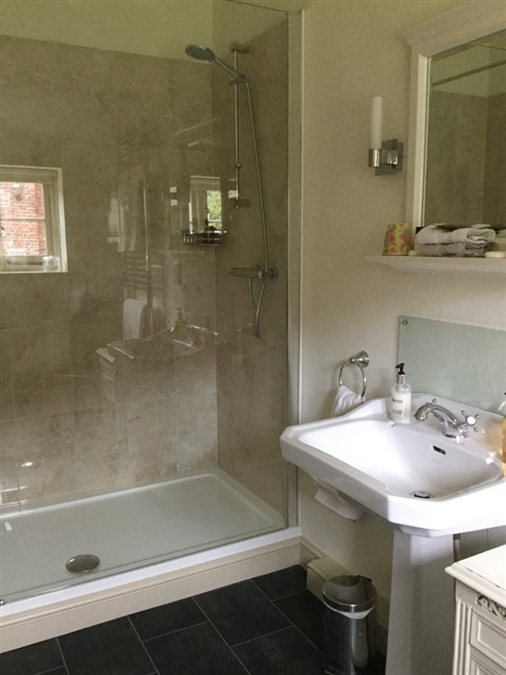 Walk in shower in the bathroom