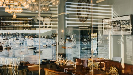 The Water's Edge Bar reflect the harbour views
