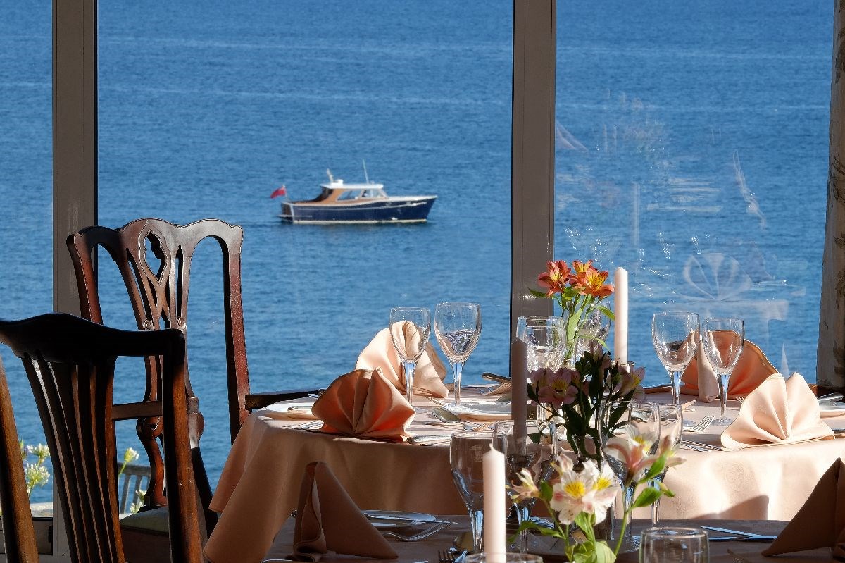 The Nare Dining Room boasts magnificent sea views on three sides