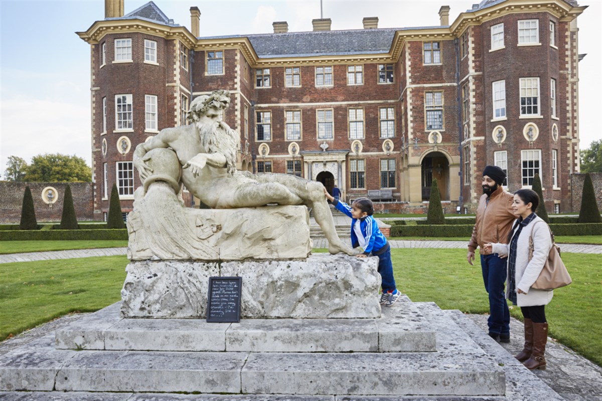 A family in the garden in October at Ham House and Garden, Surrey <span style='font-size:8px;'>®National Trust Images/Arnhel de Serra</span>