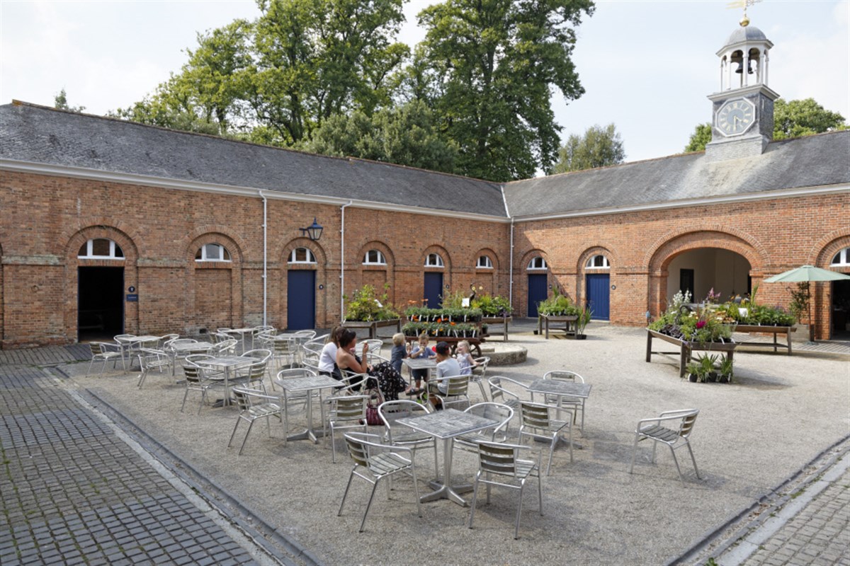 Visitors in the Stable Courtyard at Saltram estate, Devon.<span style='font-size:8px;'>®National Trust Images </span>