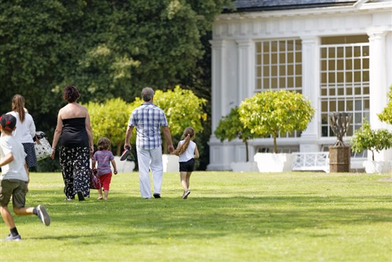 A family at Saltram estate in summer time, Devon. <span style='font-size:8px;'>®National Trust Images </span>