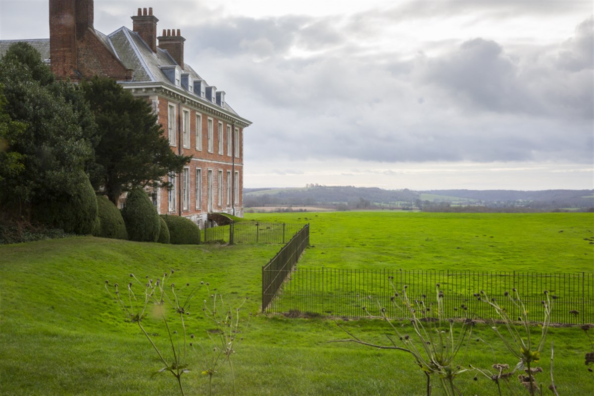 A view of the house and grounds in winter at Uppark House and Garden, West Sussex <span style='font-size:8px;'>®National Trust Images/Chris Lacey</span>
