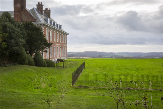 A view of the house and grounds in winter at Uppark House and Garden, West Sussex <span style='font-size:8px;'>®National Trust Images/Chris Lacey</span>