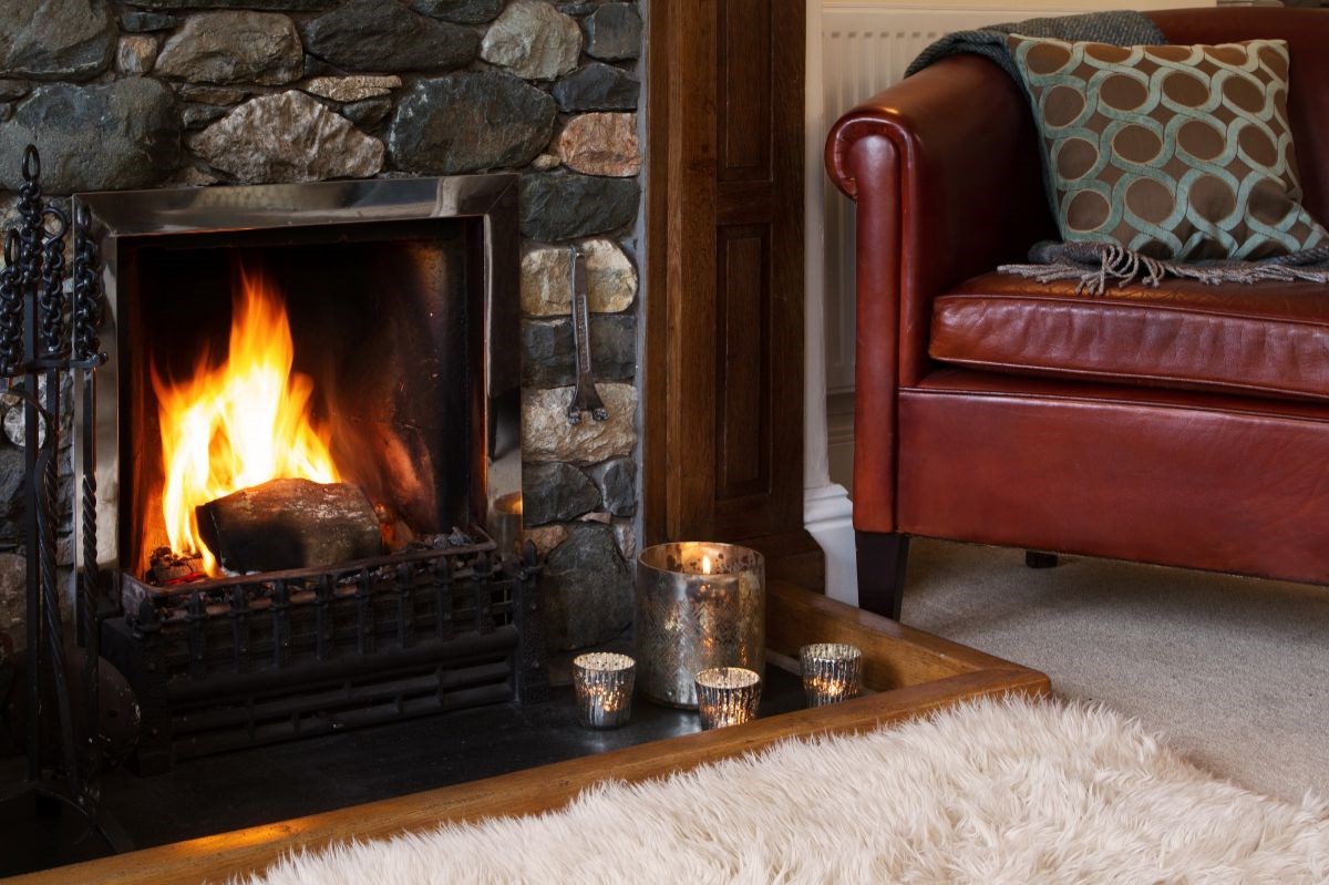 Cosy up in front of a roaring log fire - all fuel is provided free