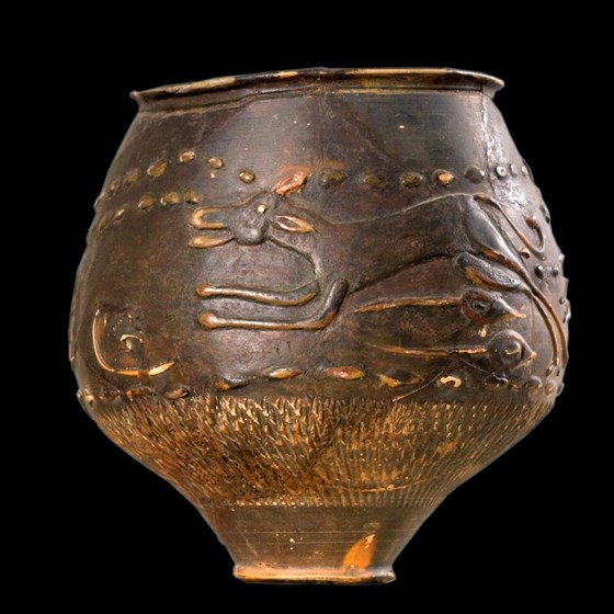 Hunt cup showing a hound chasing a deer