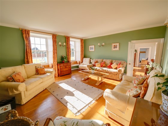 Drawing Room with Sitting room in background. Sea views, log stove.