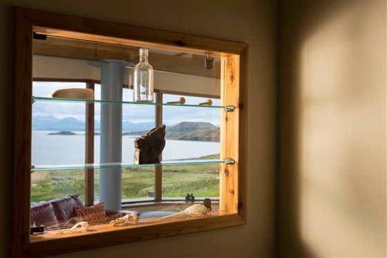 View through a display cabinet towards the Summer Isles