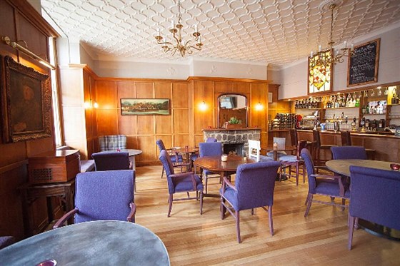 Enjoy drinks in the New Bar