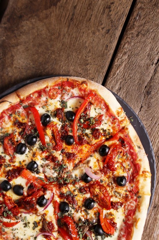 Artisan pizzas fired in the woodstone oven 