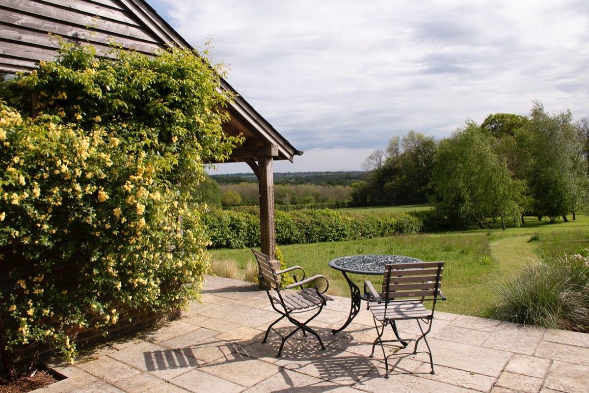 Breakfast spot overlooking wild flower garden