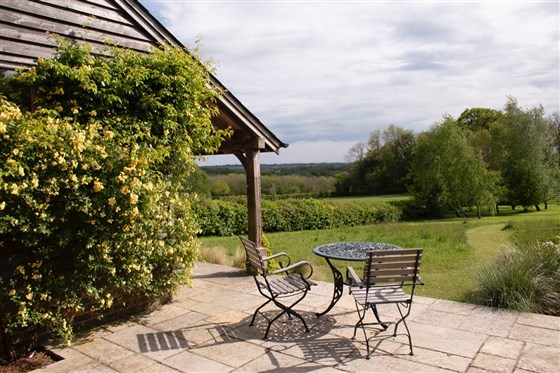 Breakfast spot overlooking wild flower garden