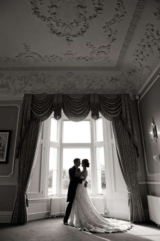 Couple in window 