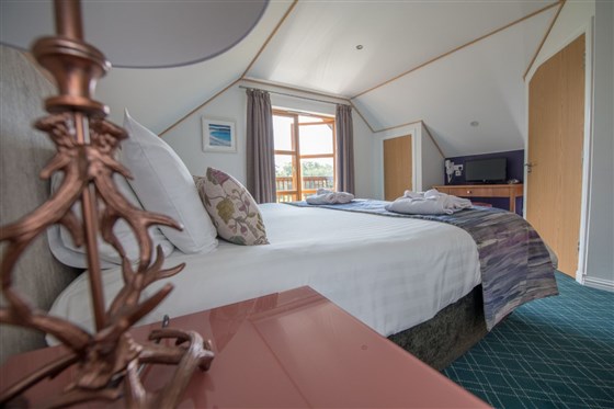 Double bedroom with balcony view