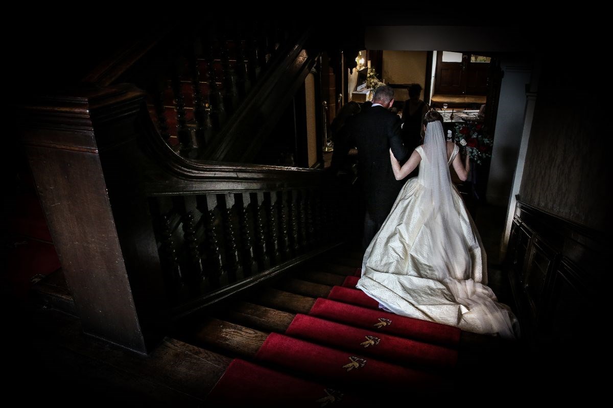A bride on the stair case going to the great hall