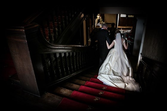 A bride on the stair case going to the great hall