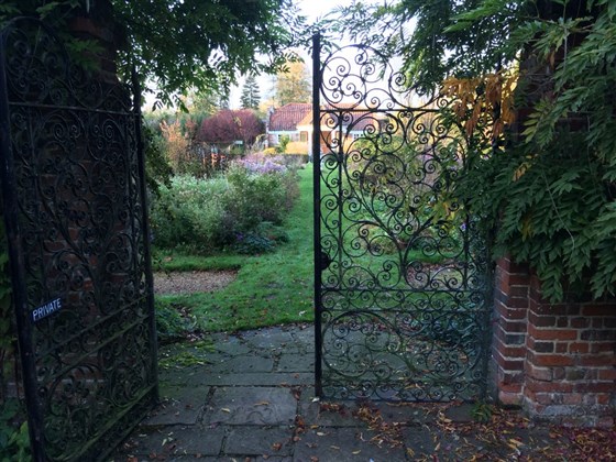 Another view of the summer house, and garden gates.