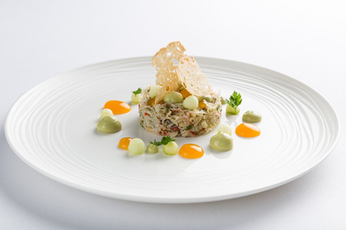 Dressed Crab with Passion Fruit, Apple, Sea Herbs and Brown Butter Dressing Starter