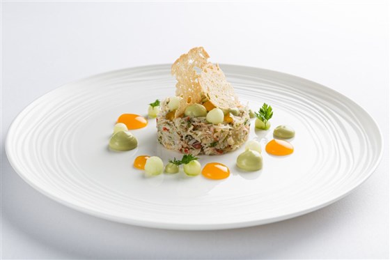 Dressed Crab with Passion Fruit, Apple, Sea Herbs and Brown Butter Dressing Starter