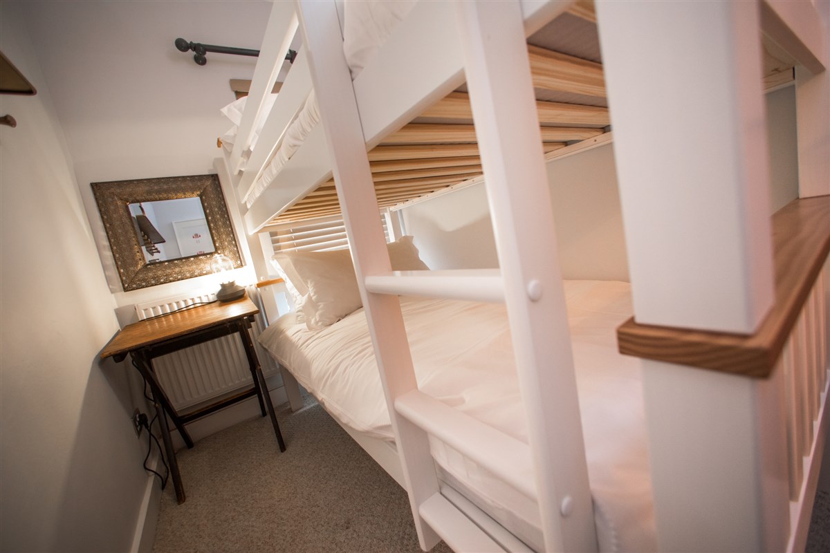 3rd Bedroom - bottom bunk, dressing table and mirror