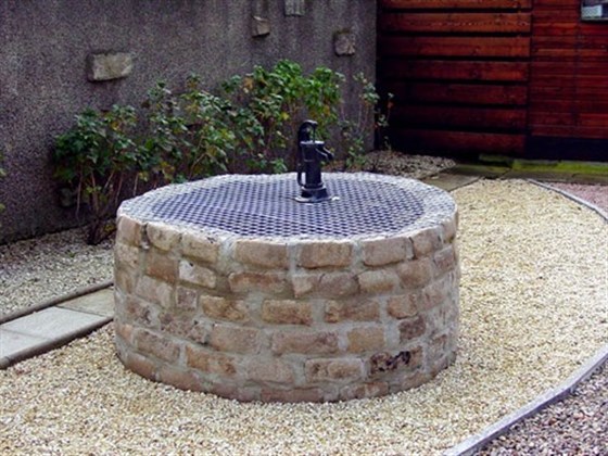 Our very own historic well in the back garden