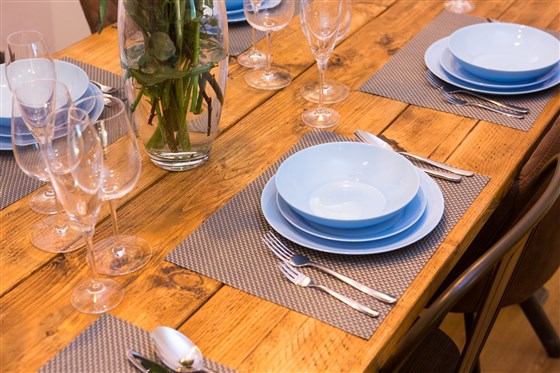 Tasteful blue crockery and quality cutlery