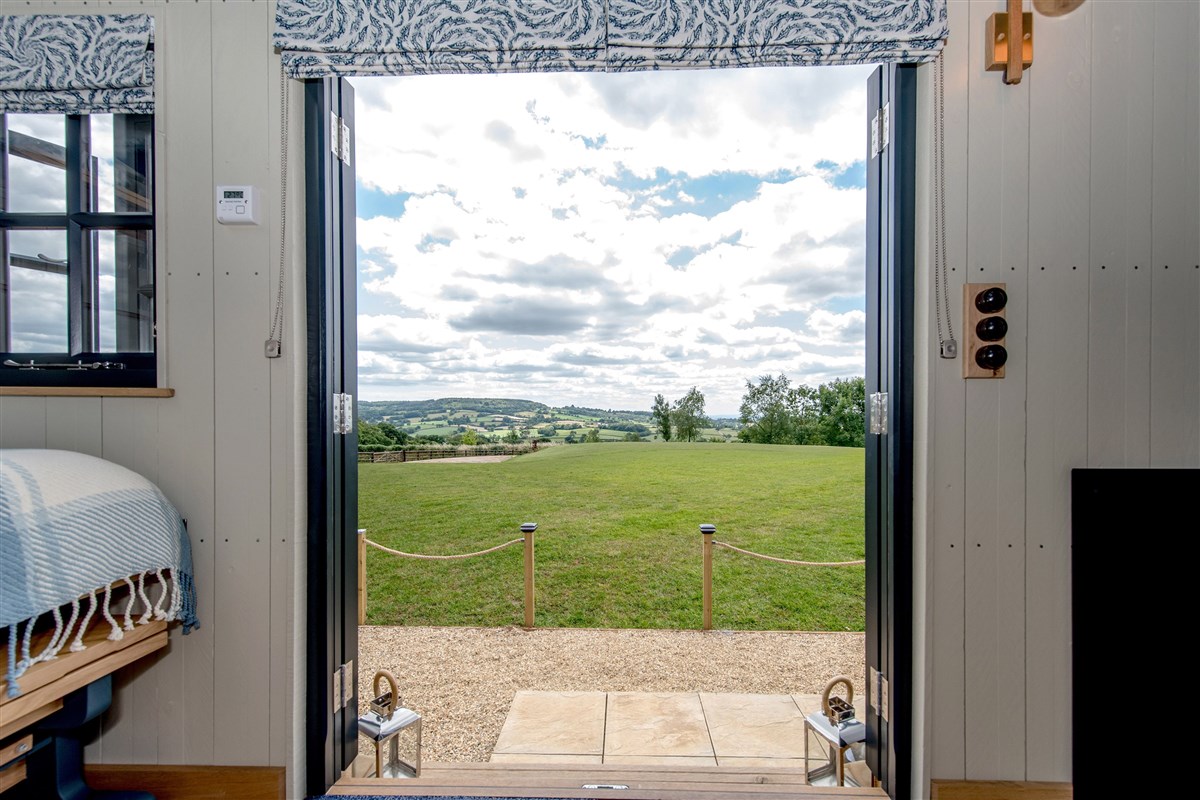 The Devon countryside rolls out before you