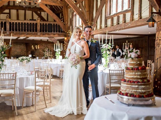 Bride & Groom in the Tithe Barn