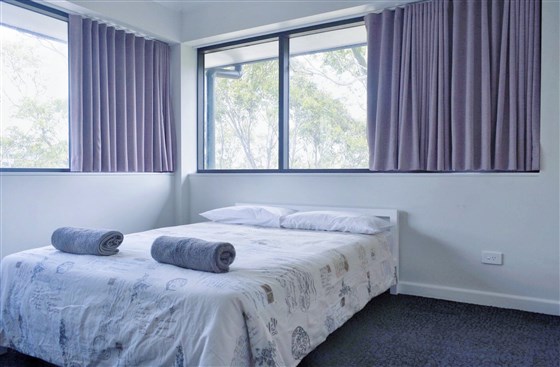 Chambre TRL avec salles de bains communes