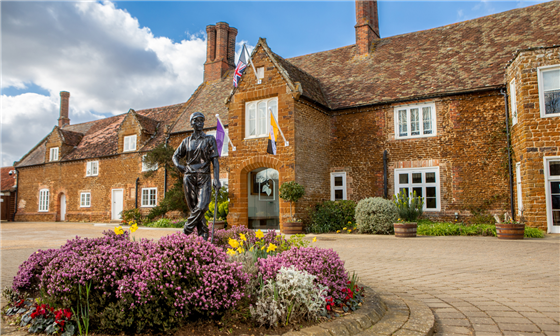 Hotel Exterior with Statue