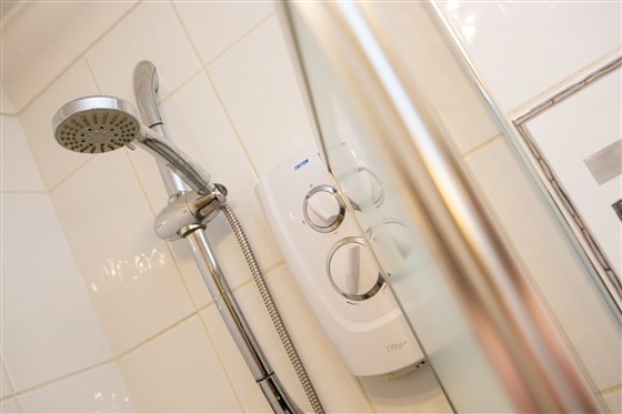 Electric shower and complimentary toiletries provided