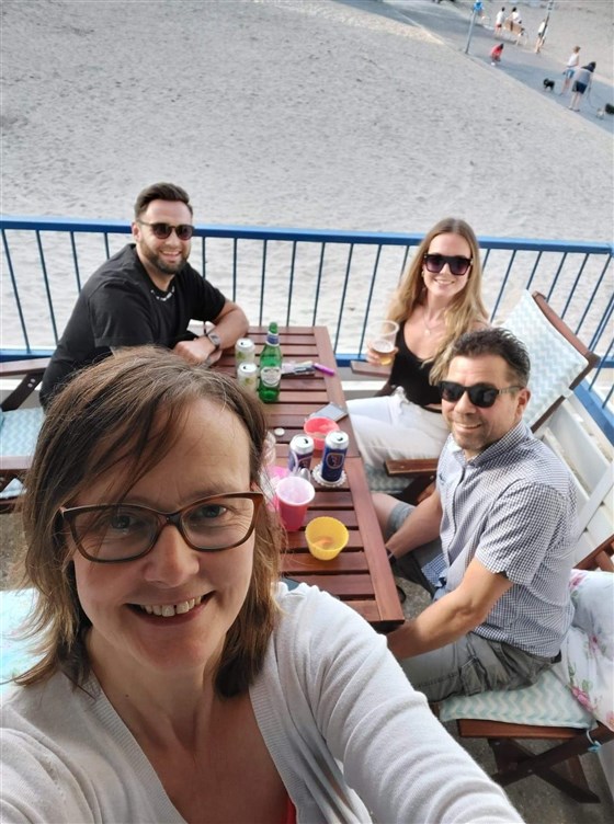 The Fam having beach hut time.