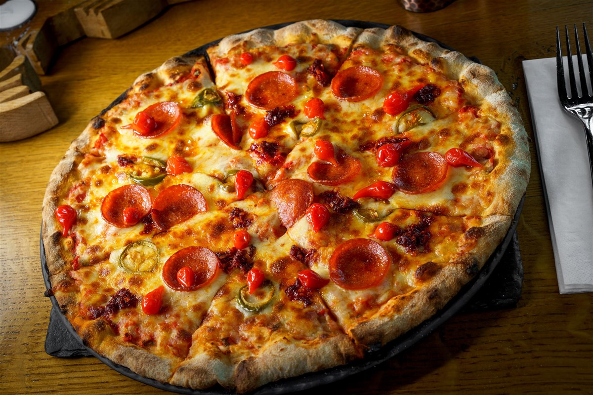 Artisan pizzas from the woodstone-fired oven