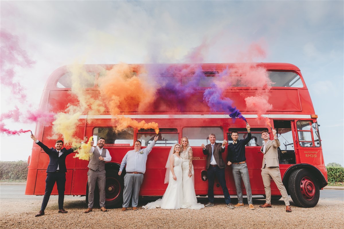 Big Red Bus to take guests to and from the beach for photos