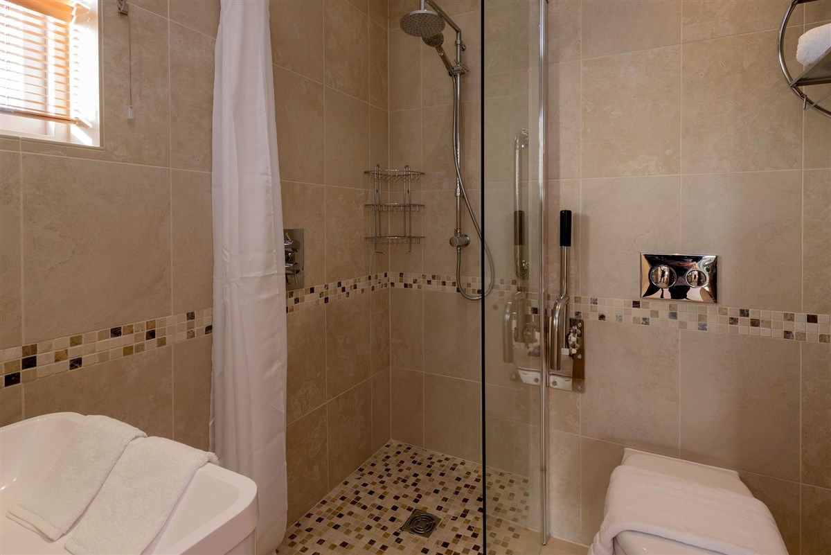 Bedroom 1 has an en suite shower room