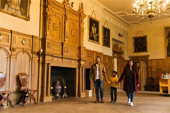 Photograph of a family inside Temple Newsam house