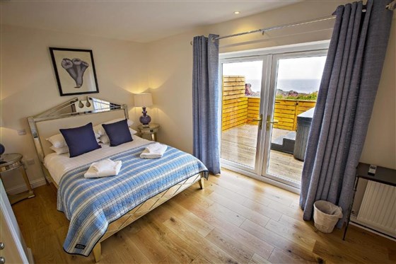 Suite avec bain à remous et bain à remous extérieur