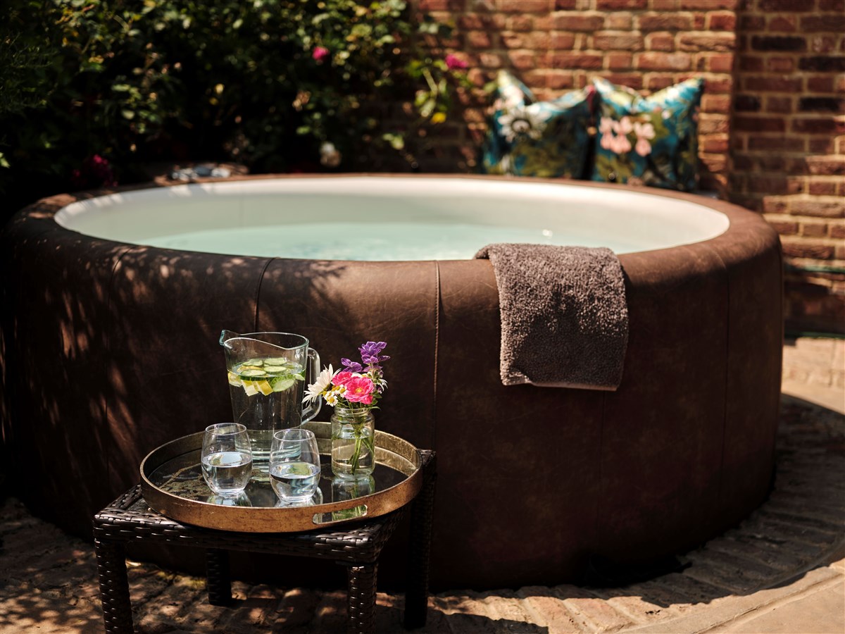 Hot tub in walled garden