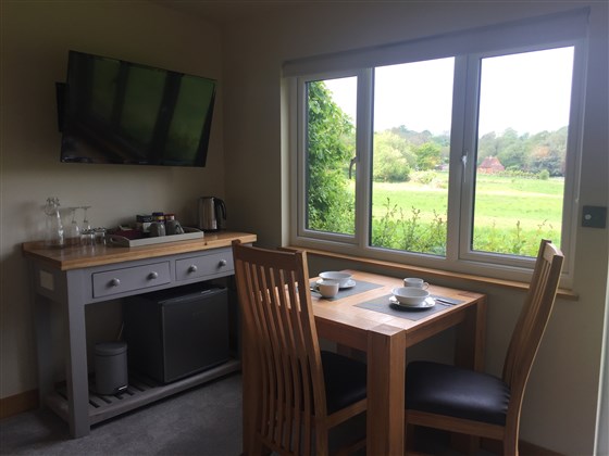 Dining table with view over meadow