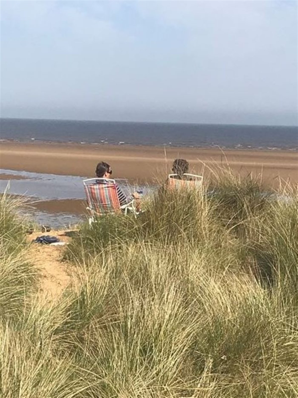 infront of hut up on the dunes 