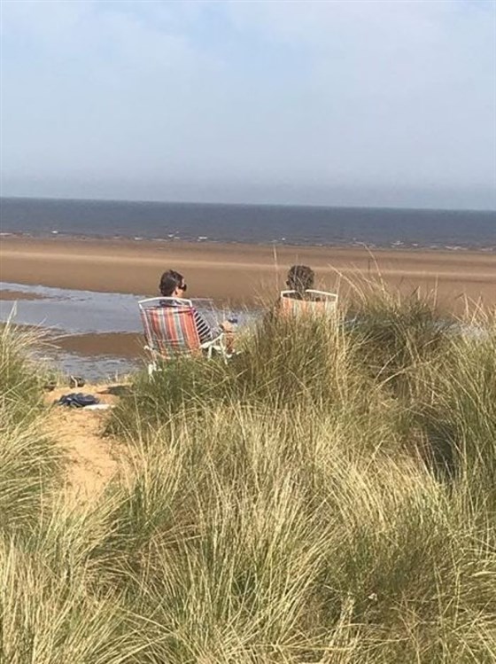 infront of hut up on the dunes 