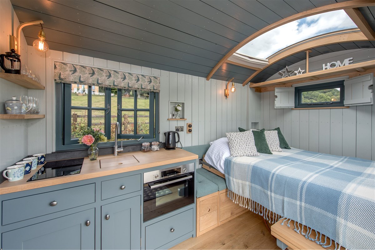 Above the bed, a huge stargazer panel; count the stars before you drift off to sleep