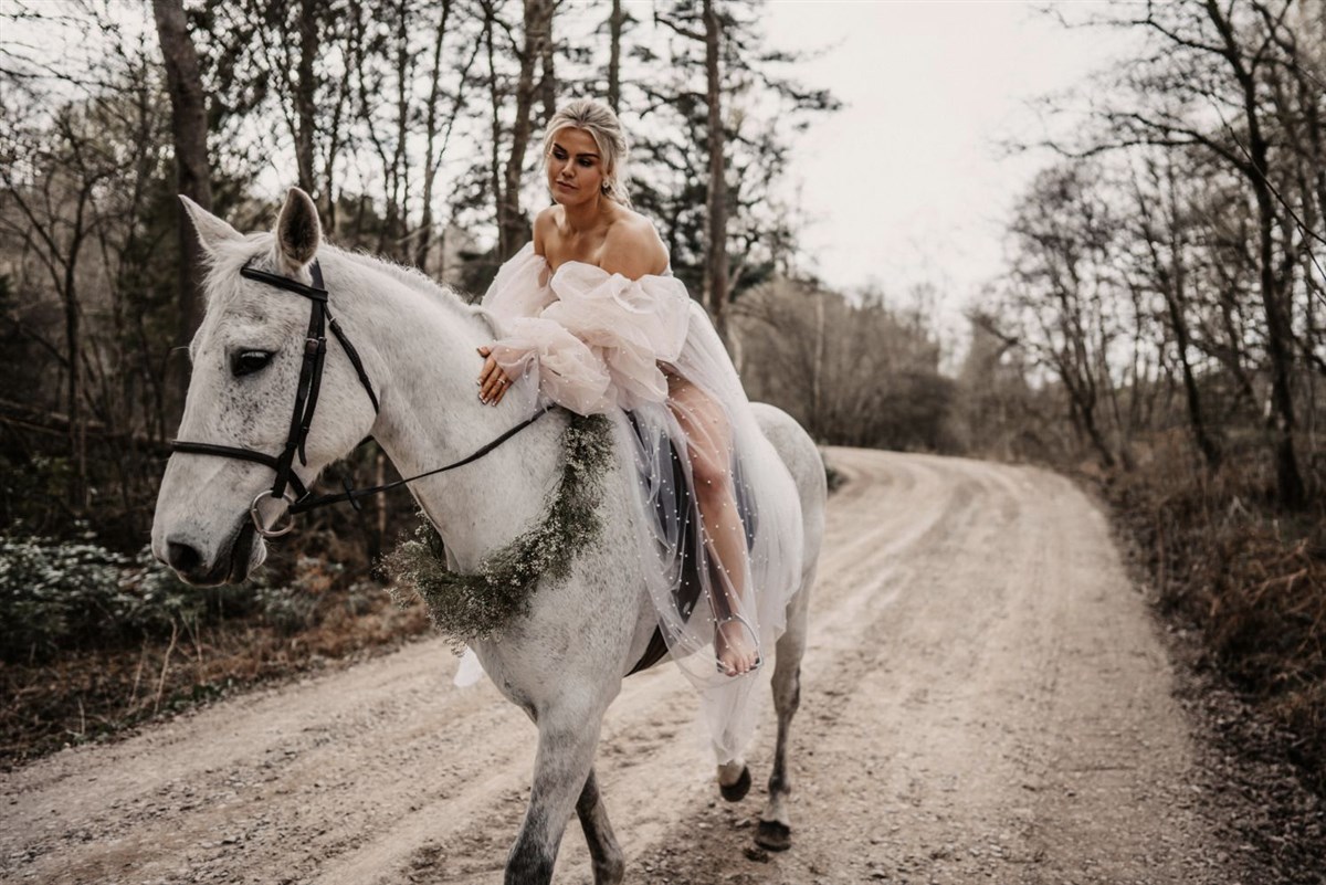 Bride arrival by horseback