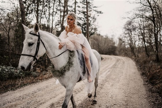 Bride arrival by horseback